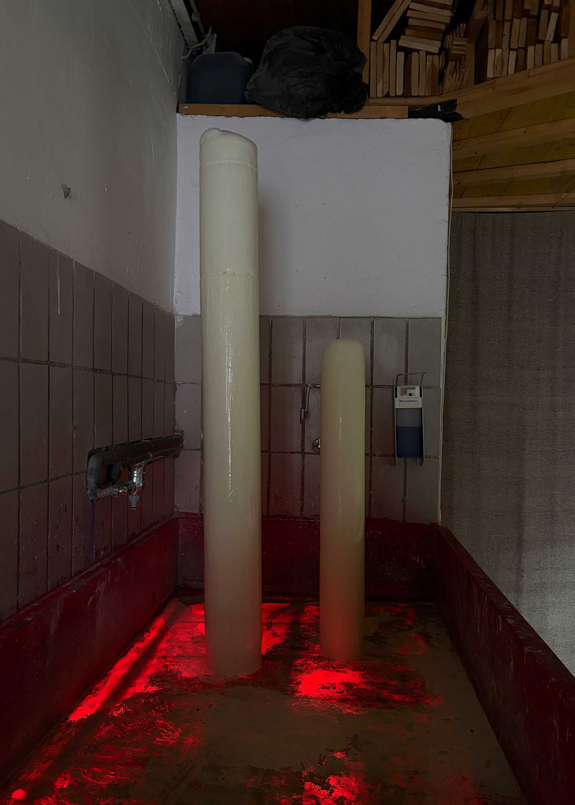 Luka Berchtold - drip drip drip (with Love from Harriet), 2026, 36 liters of melting frozen infant formula, 2 metal tubs, fan noise, letter (c) Luka Berchtold
